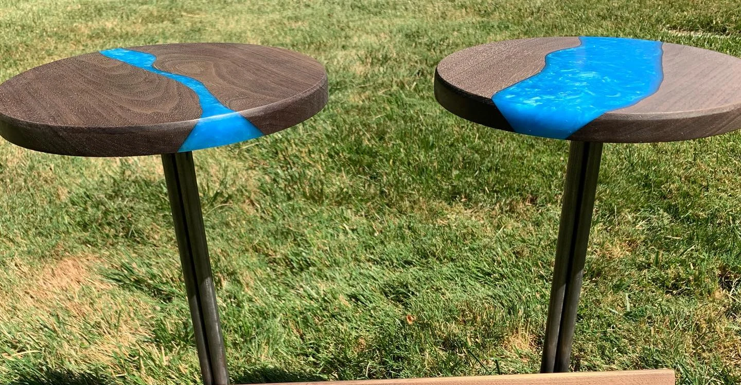 Pair of blue-river martini tables, cropped from the original collection photograph.