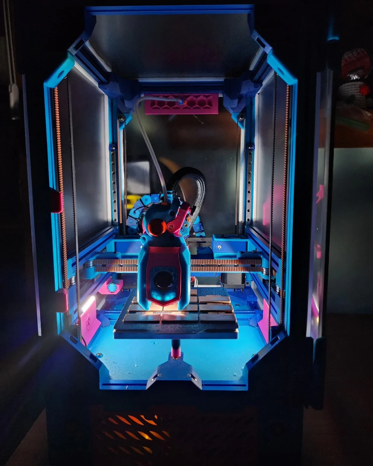 The blue-and-pink EffZero printer, photographed as an assembled machine.