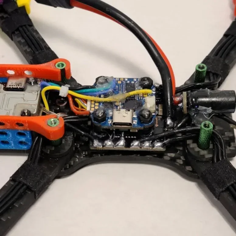 Electronics and wiring inside the LEGO-themed FPV aircraft.