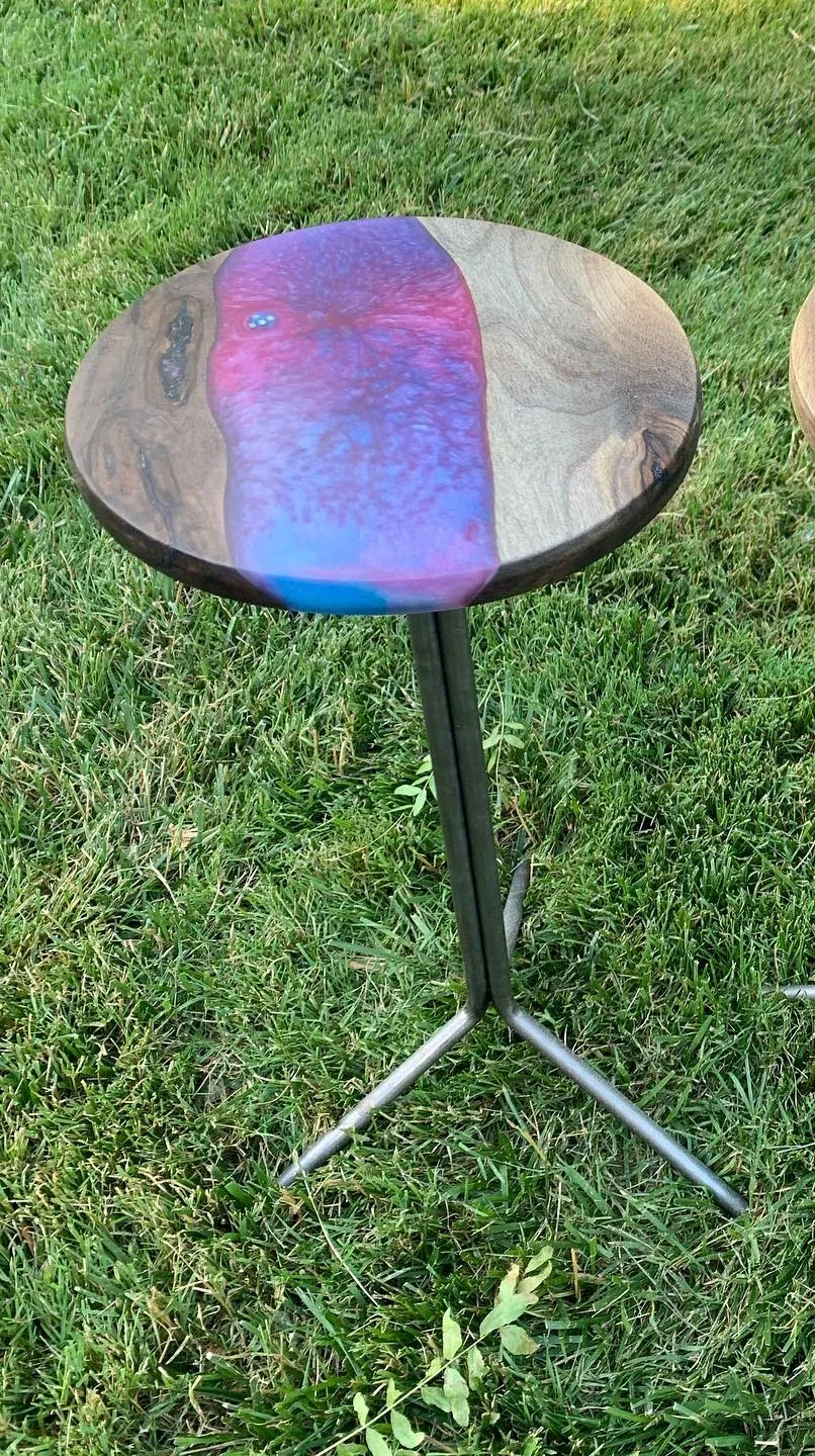 Purple-blue resin table, cropped from its original paired photograph.