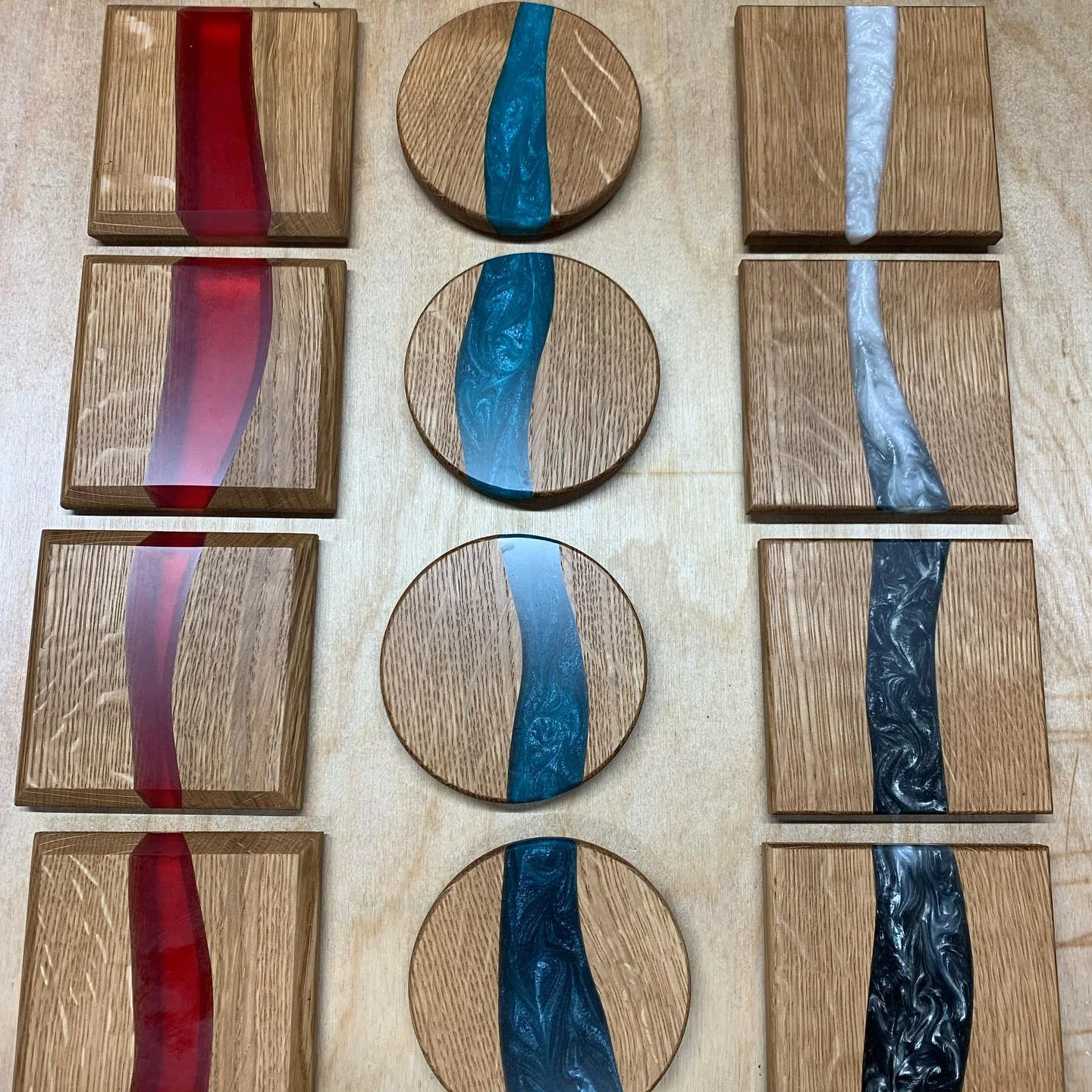 Three coaster sets with red, blue, and light-blue resin, arranged in columns.