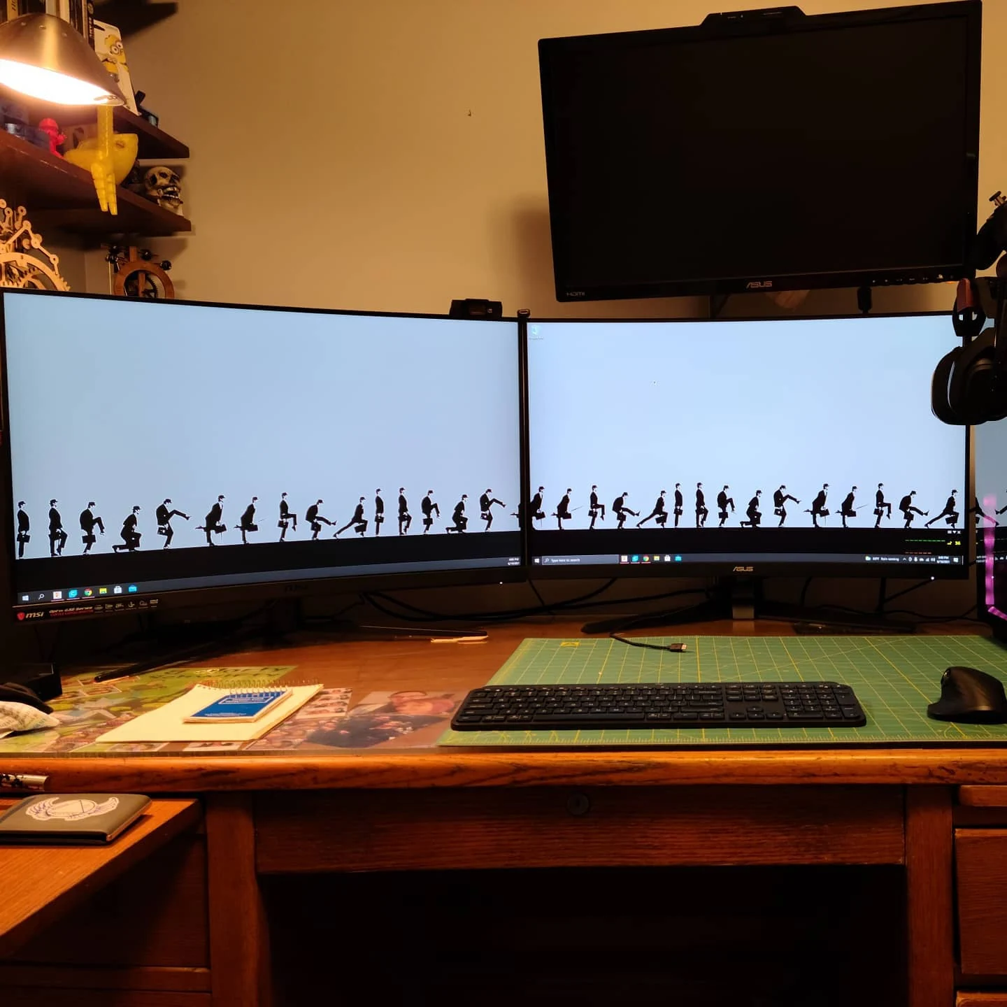 The dual-monitor desk setup documented with the 2021 PC build.