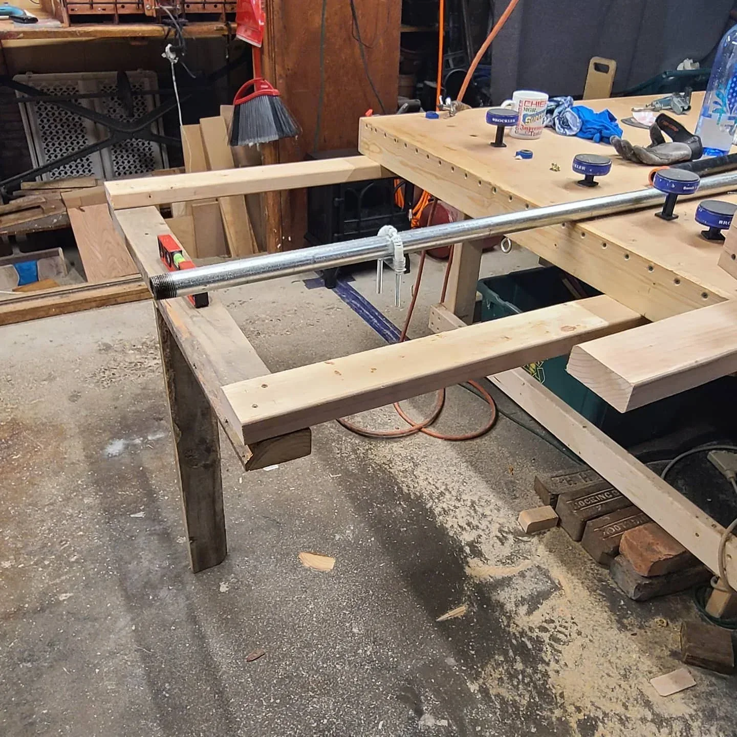 Constructed router sled positioned over the workshop bench.