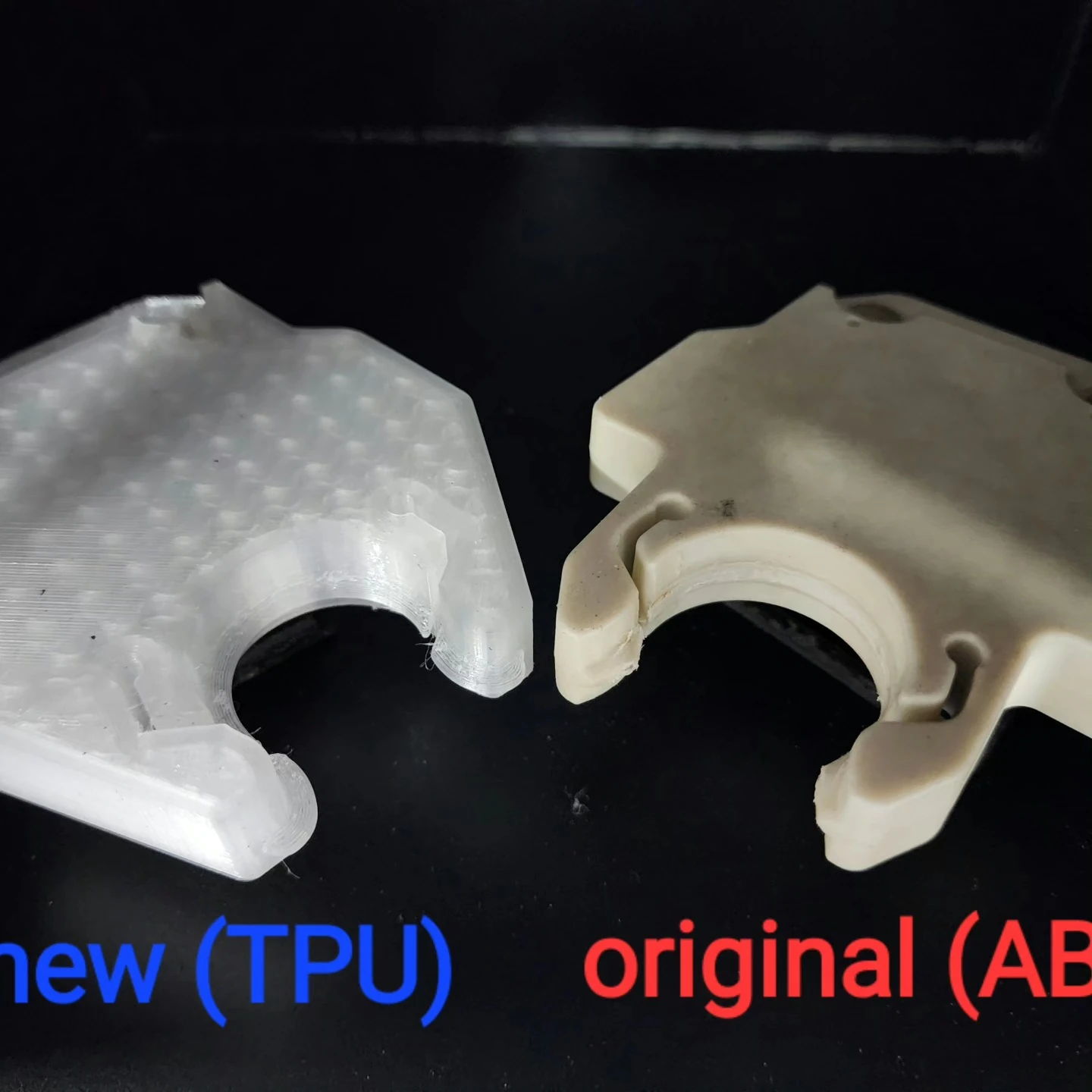 The translucent printed TPU tool fork beside the original beige ABS component.
