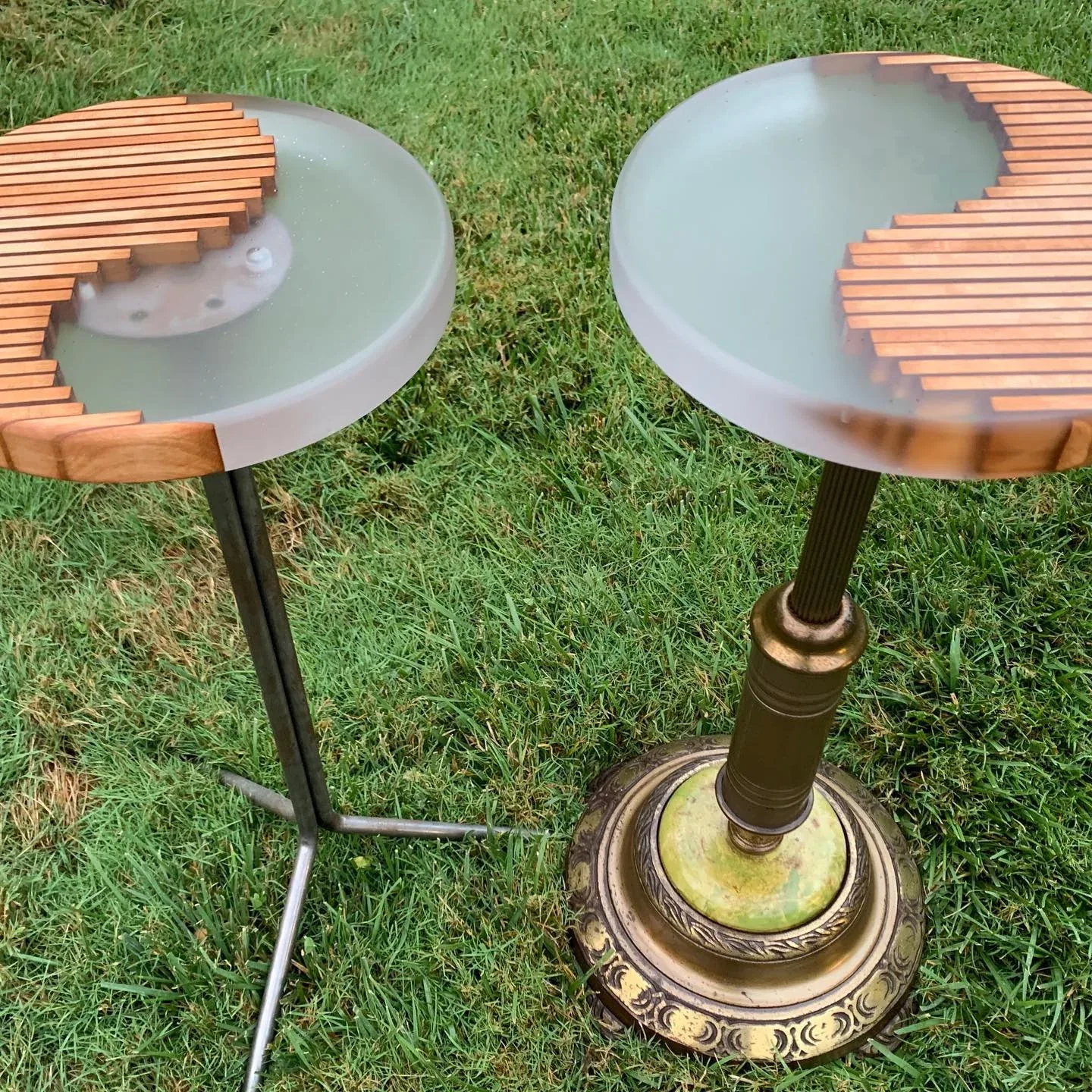 Two complementary birch-and-resin martini tables photographed outdoors.